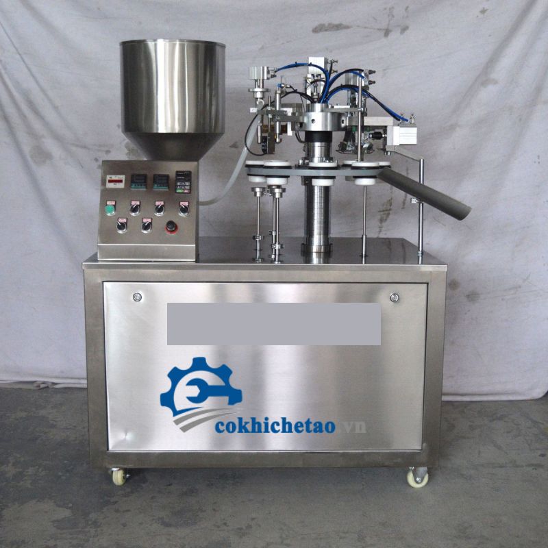 Máy chiết rót và dán đáy tuýp kem